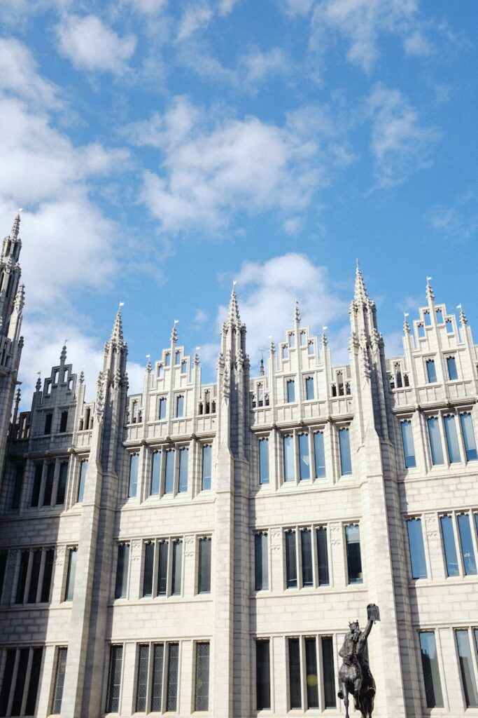 white granite building under blue sky